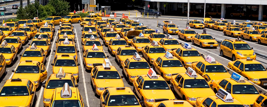 Yellow Airport Cabs in Oakland on the road